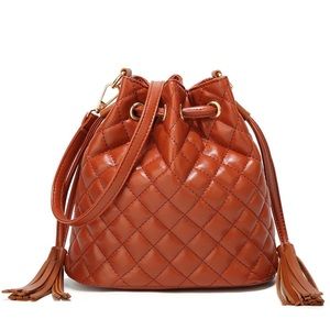 Burnt orange purse with adjustable strap